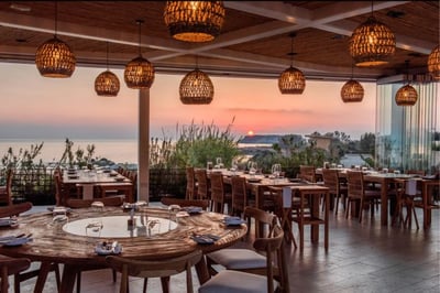 The outside terrace at Mesoyios restaurant at dusk