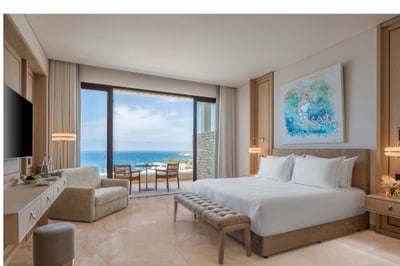 Hotel bedroom with balcony and seaview