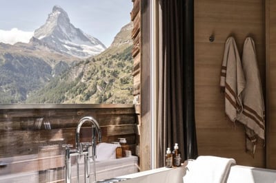 bathroom with a view of the matterhorn at the cervo mountain resort in zermatt