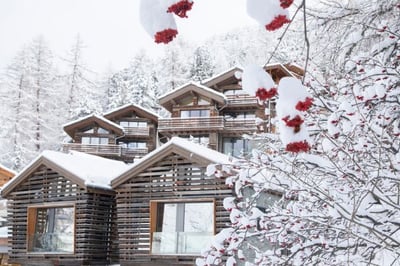 chalets in the snow at the cervo mountain resort in zermatt