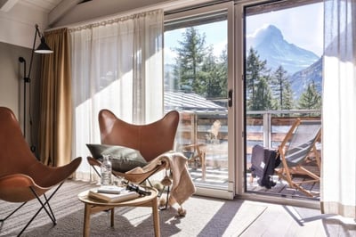 bedroom with view of the matterhorn at the cervo mountain resort in zermatt
