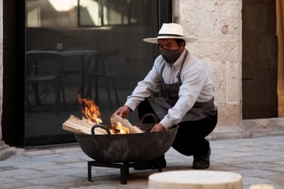 fire pit being built in peruvian hotel