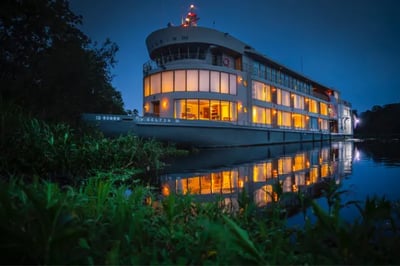 Exterior image of Delfin Peru nighttime