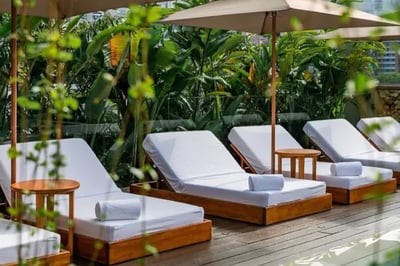 Chic pool loungers at El Cielo Medellin
