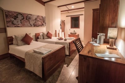 family suite with twin beds at the galapagos safari camp