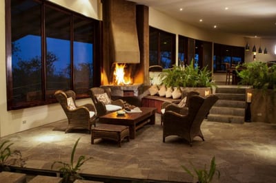 main living area with open fire at the galapagos safari camp