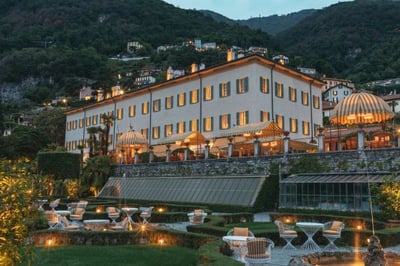 terrace at passalacqua at dusk with outdoor lighting