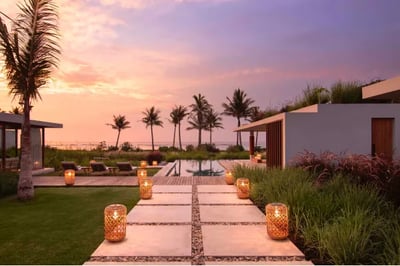 sunset over cap karoso pool in sumba indonesia