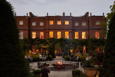 sunset drinks on firelit terraces, the grove
