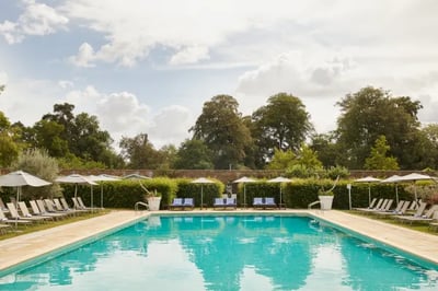 outdoor pool and sunloungers at the grove hotel UK
