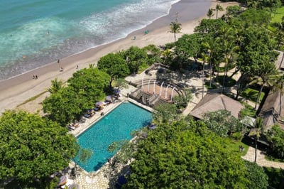 aerial viw of the swimming pool and beach at the oberoi beach resort bali