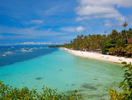 1 Boat in a bay of water in the Philippines