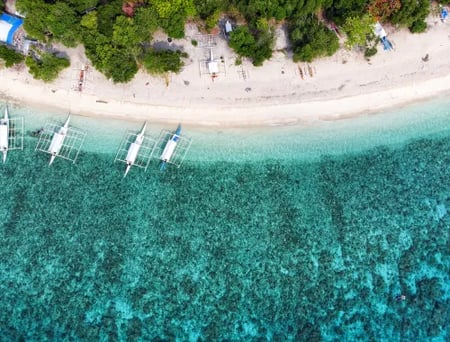 3 Boat in a bay of water in the Philippines