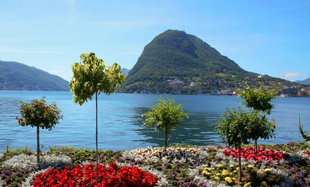 5 Waterfront view of Morcote village on Lake Lugano, Switzerland. Morcotte is considered "The Pearl of Cerasio"