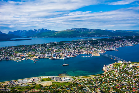 11 Reine, Lofoten, Norway. The village of Reine under a sunny, blue sky, with the typical rorbu houses. View from the top