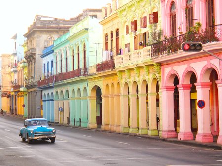 14 American green Chevrolet classic car drives on the main road in Havana Cuba City before the Capitolio - Serie Cuba Reportage