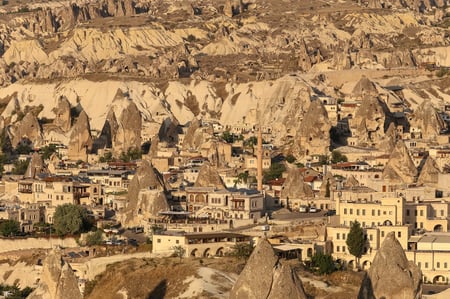 4 Hot air balloon at sunrise over mountains, Goreme, Cappadocia.