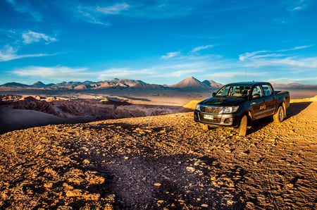 2 Extreme landscape, dirt road in the moon valley, at San Pedro de Atacama, Chile