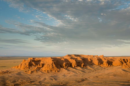 5 A caravan of camels resting in the sand of the Gobi Desert