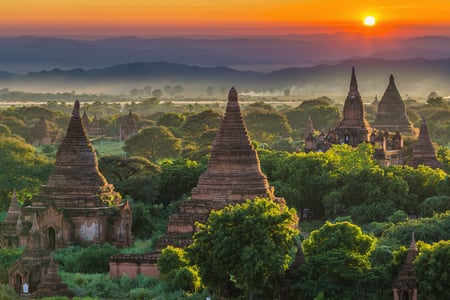 3 Bagan, Myanmar ancient temple ruins landscape in the archaeological zone at dusk