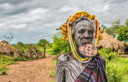 7 Priest looking over scarp at monastery Debre Damo, Ethiopia.