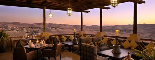 view of sand dunes from restaurant at luxurious hotel in abu dhabi desert