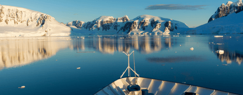 View of Antarctica from bow of small luxury cruise ship