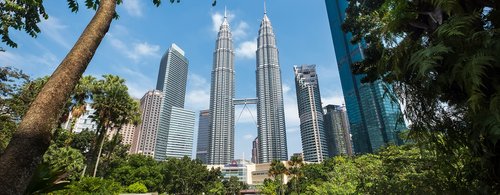 Famous Petronas Twin Towers captured from KLCC Park City Centre in Kuala Lumpur, Malaysia