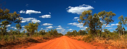 outback red road in the Northern Territory of Australia on a sunny day