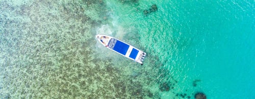 Aerial view of beach with boats, Koh Phangan, Thailand