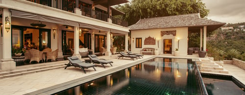 Private swimming pool near luxury villa. Sunny summer travel vacation