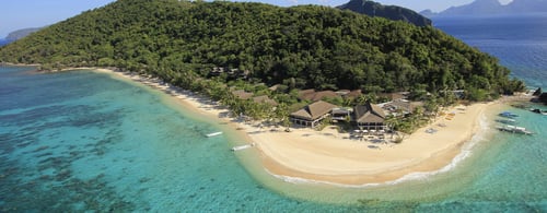 Pangulasian-Island-Resort_Aerial-Beach_Ext