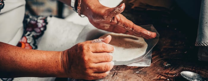 Preparing dishes like quesadillas and tacos in Mexico