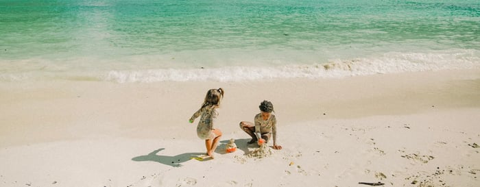 Children playing on a beach in Thailand