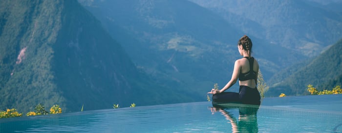 young woman enjoy the nature on the mountain lake