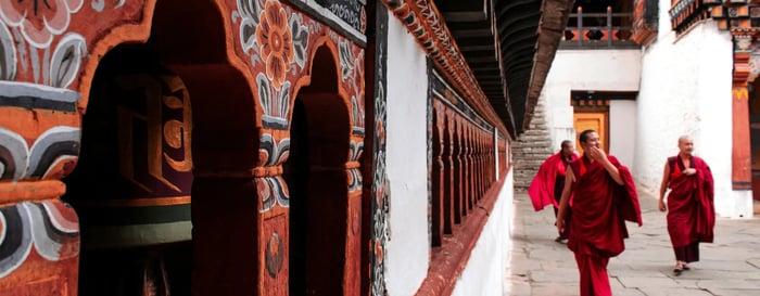 Monks at Paro Taktsang, also known as the Tiger's Nest Monastery