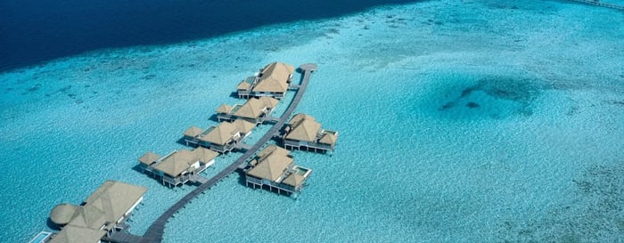 aerial image of Como Maalifushi water villas