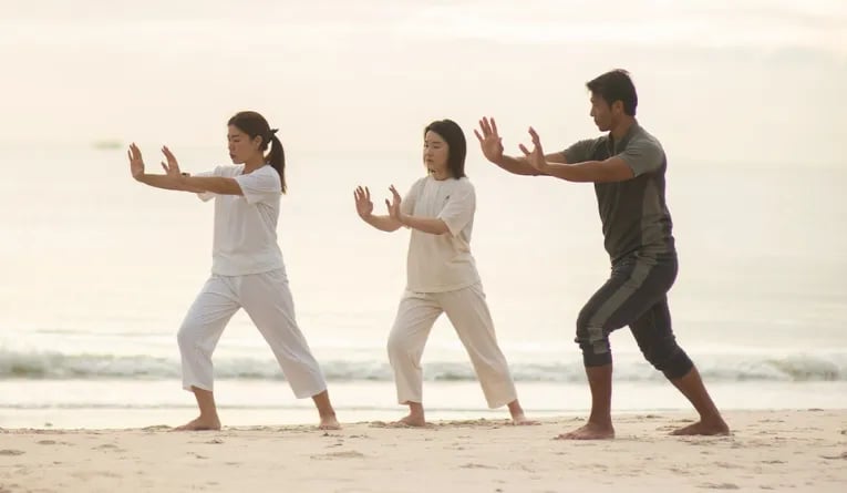 Tai chi on Hua Hin beach at Chiva-Som, Thailand