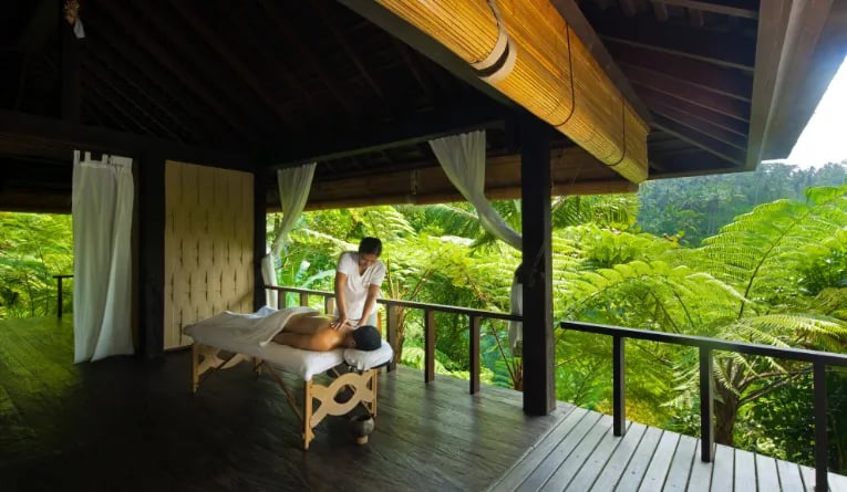 Guest receiving a massage at COMO Shambhala Estate's spa in Bali