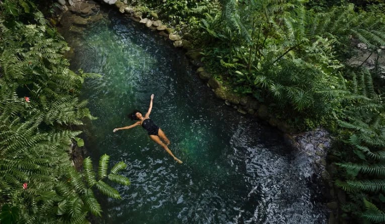 Guest relaxing in "The Source" at COMO Shambhala Estate in Bali