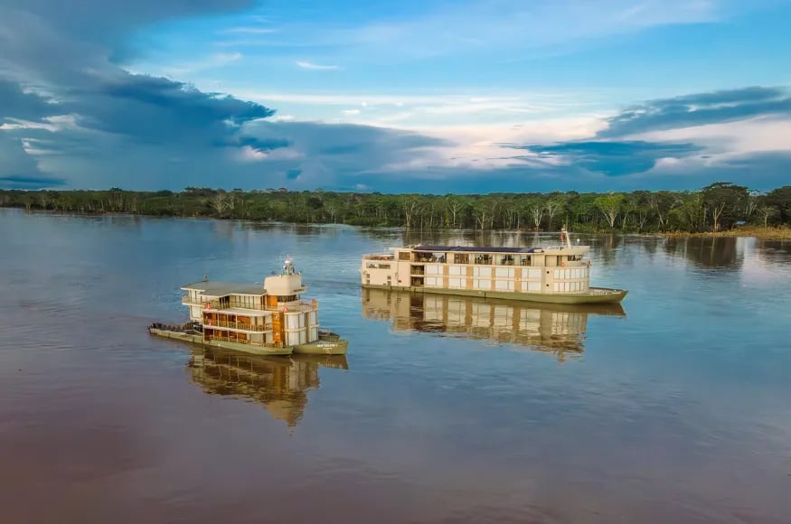 Delfin fleets side by side on the Peruvian Amazon river
