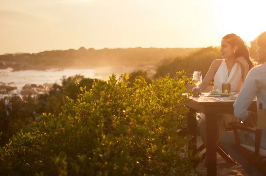 Couple enjoying drinks at Chena Huts Sri Lanka